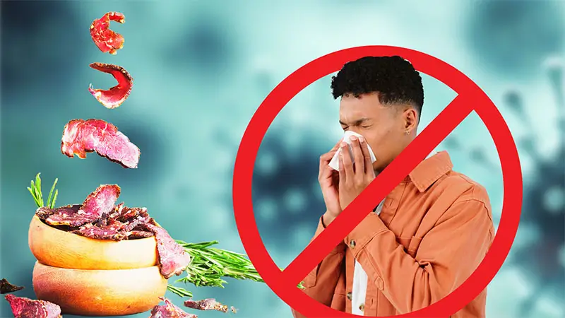 Sick Man sneezing with biltong prohibiting further illness